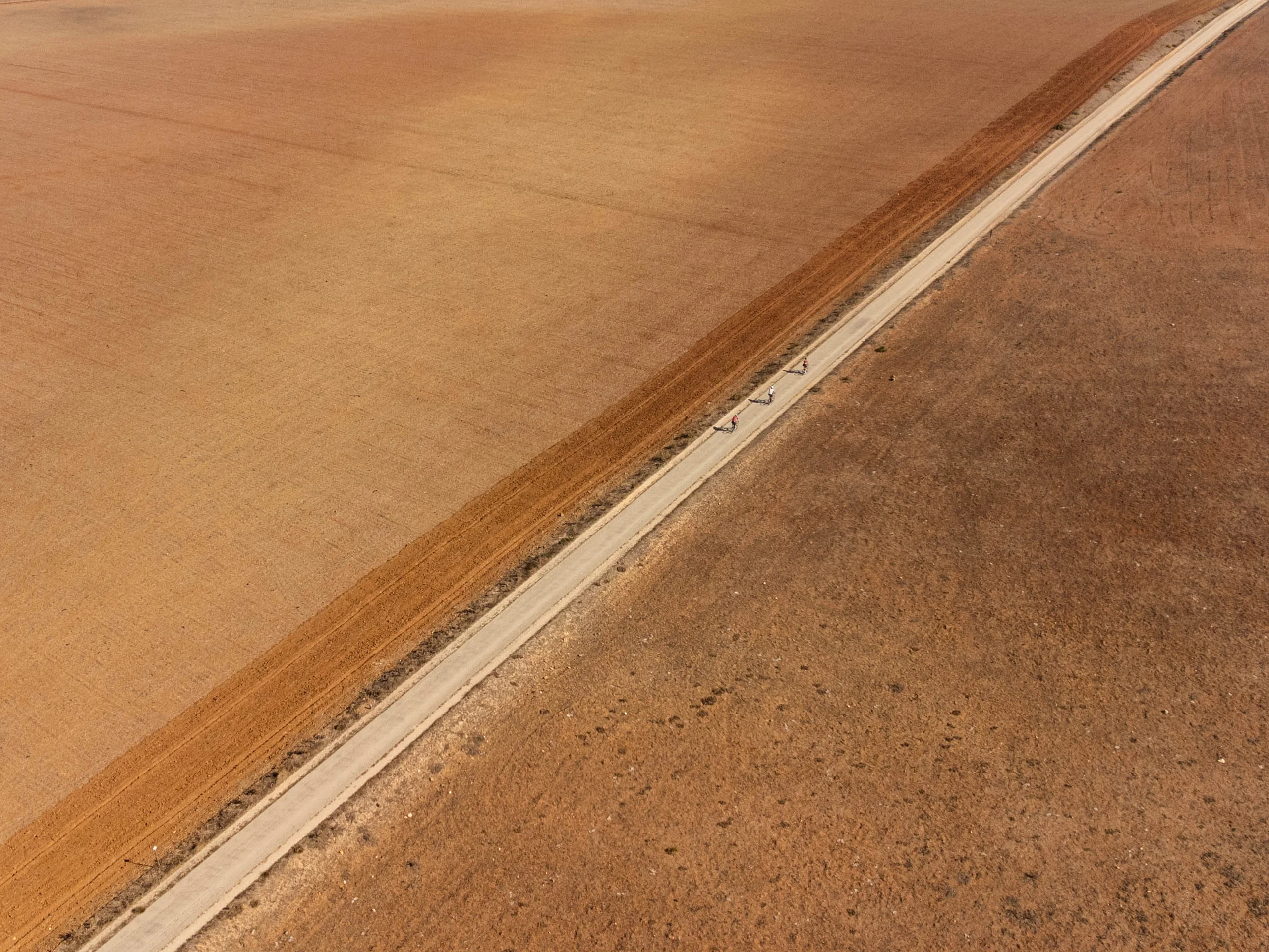 Dry fields and a track, seen from the air