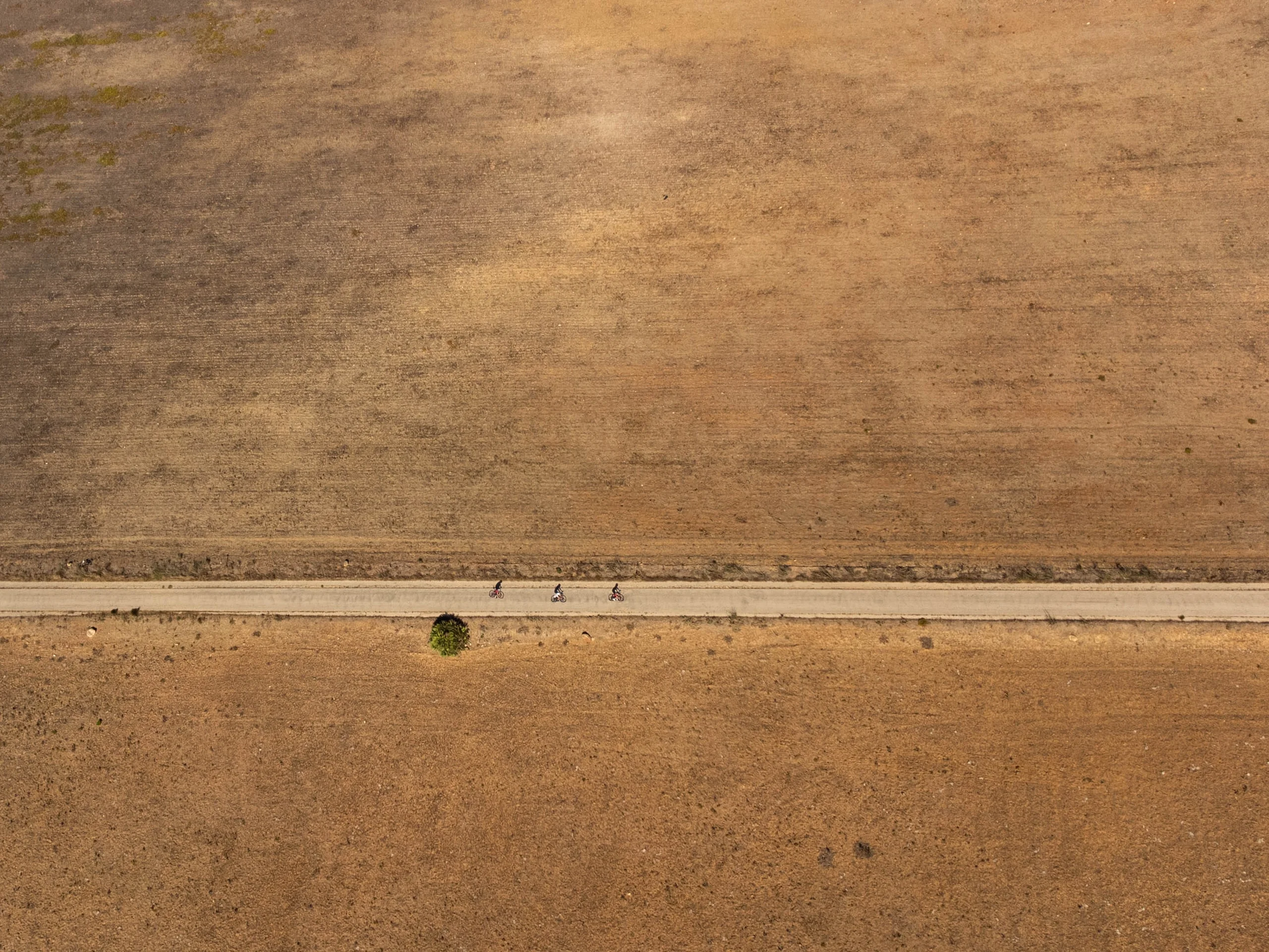 A long straight road across the plain, seen from the air