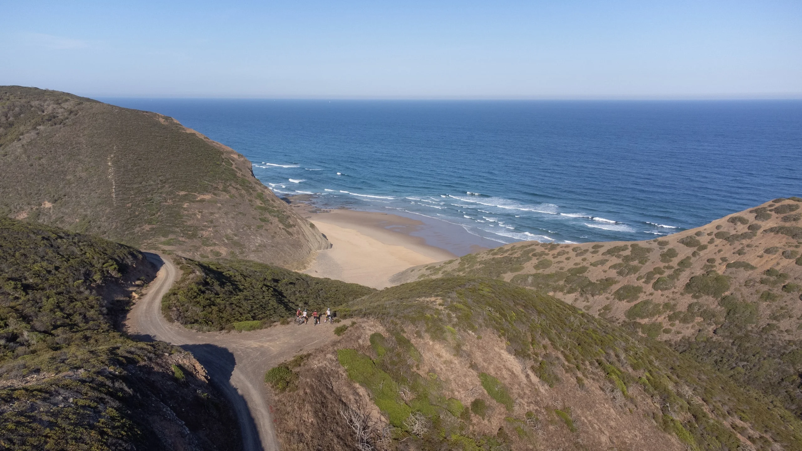 Looking down from the cliff path to a beach west of Lagos