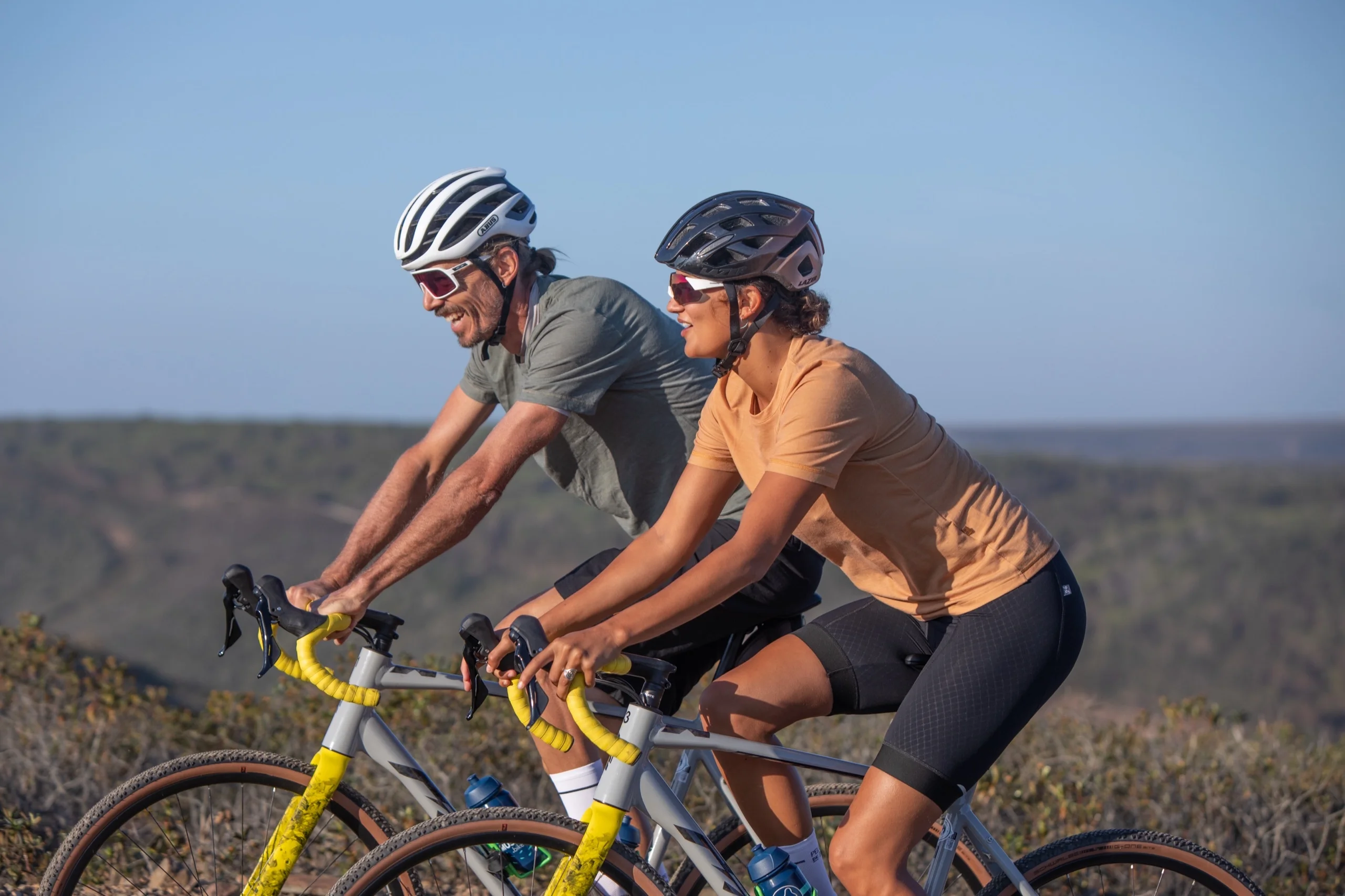 Riders on a dirt track along the cliffs of the Costa Vicentina